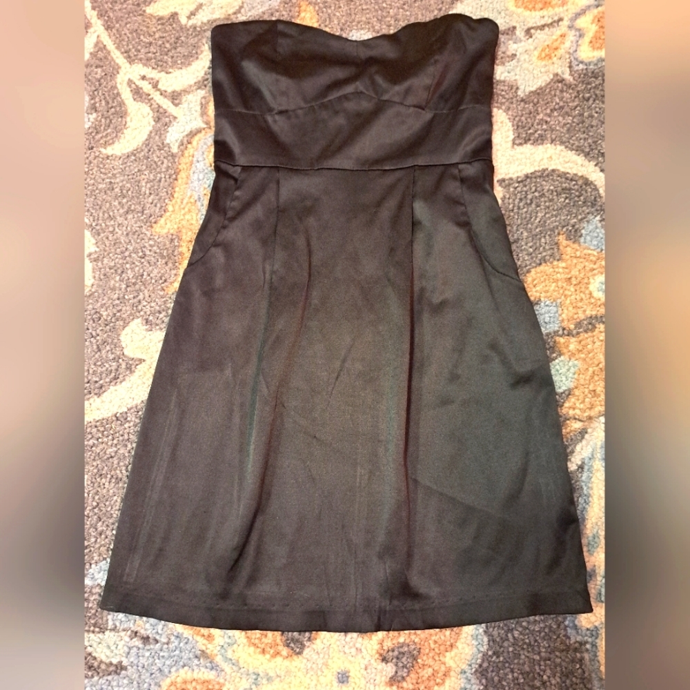 Black satin cocktail dress.   219